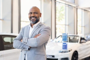 Smiling Salesman | The Payoff of Non-Commissioned Auto Sales